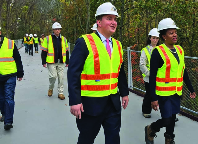 Neponset Greenway Tour: Sen. Forry, right, and Rep. Cullinane walk a new bridge installed this summer over the Neponset River. The span connects Milton and Mattapan.